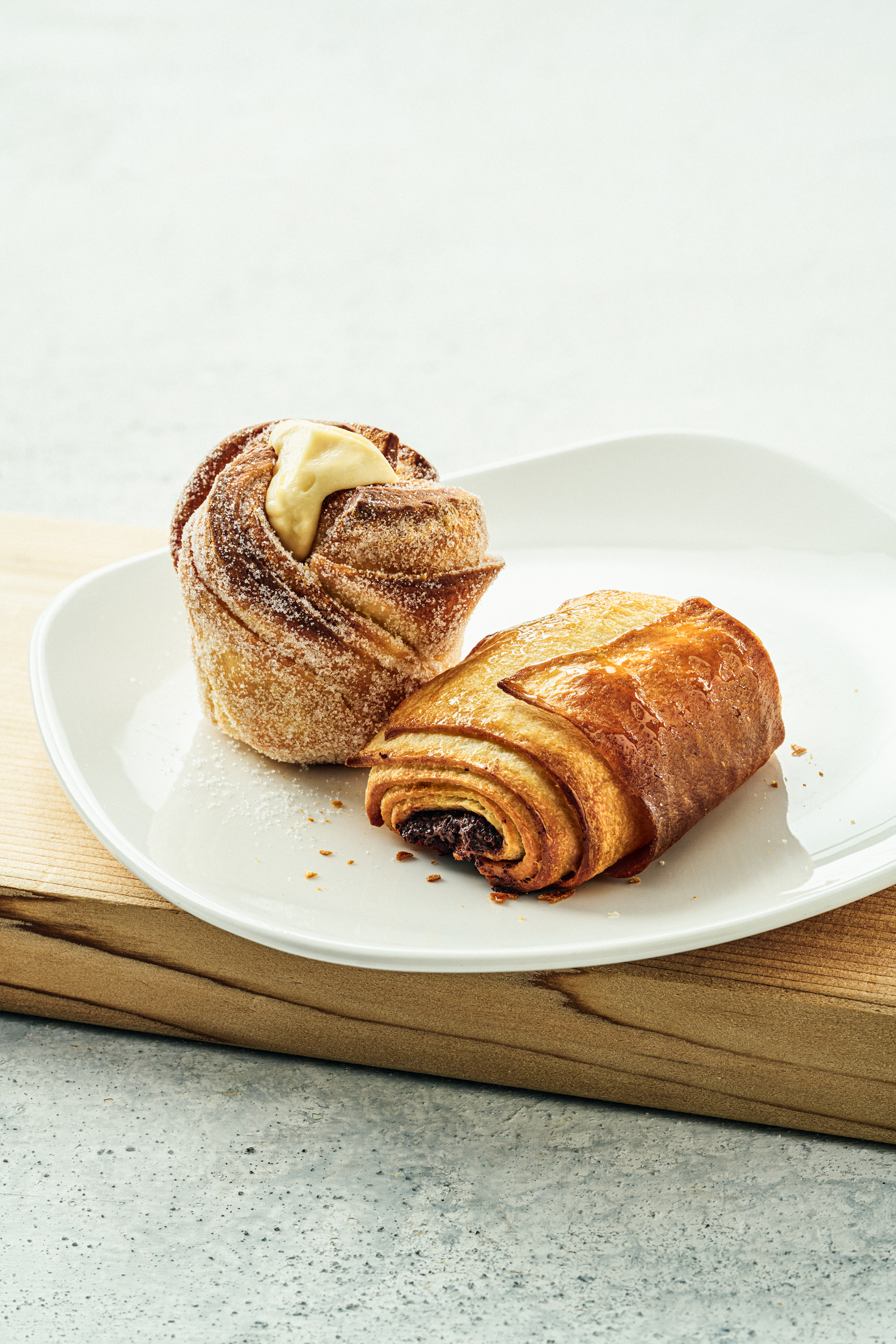 Two Morning Pastries served on a plate.