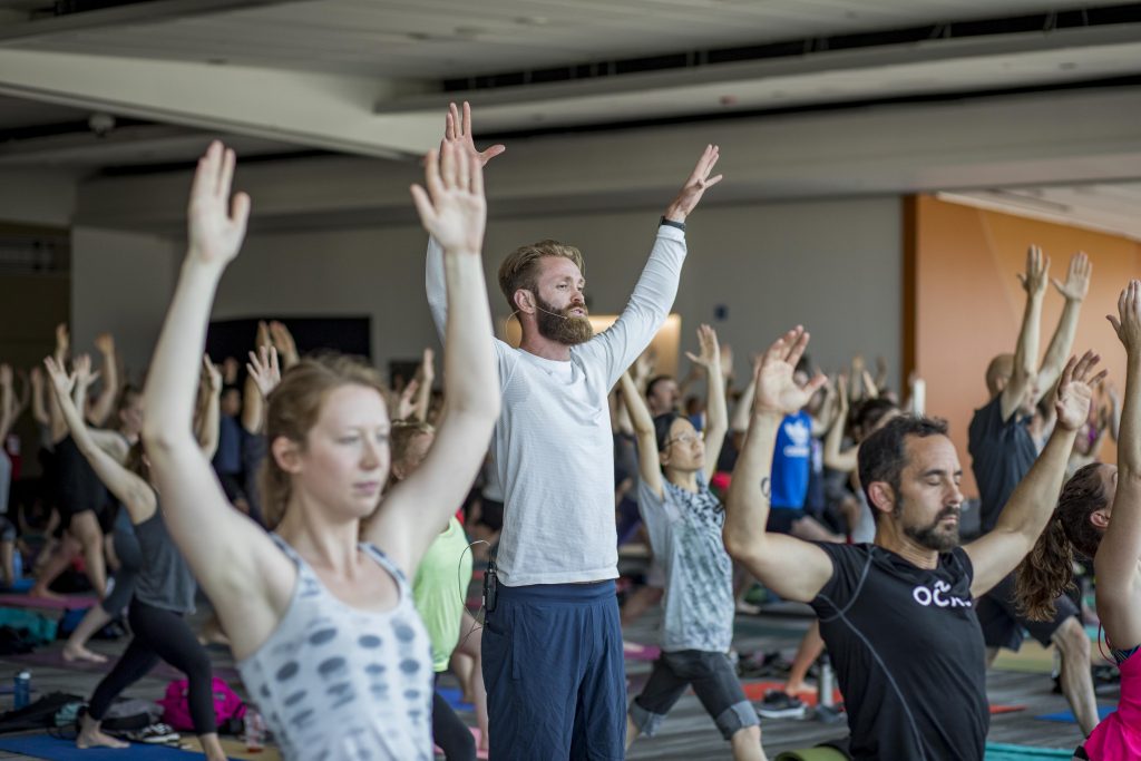 yoga class hands in the air