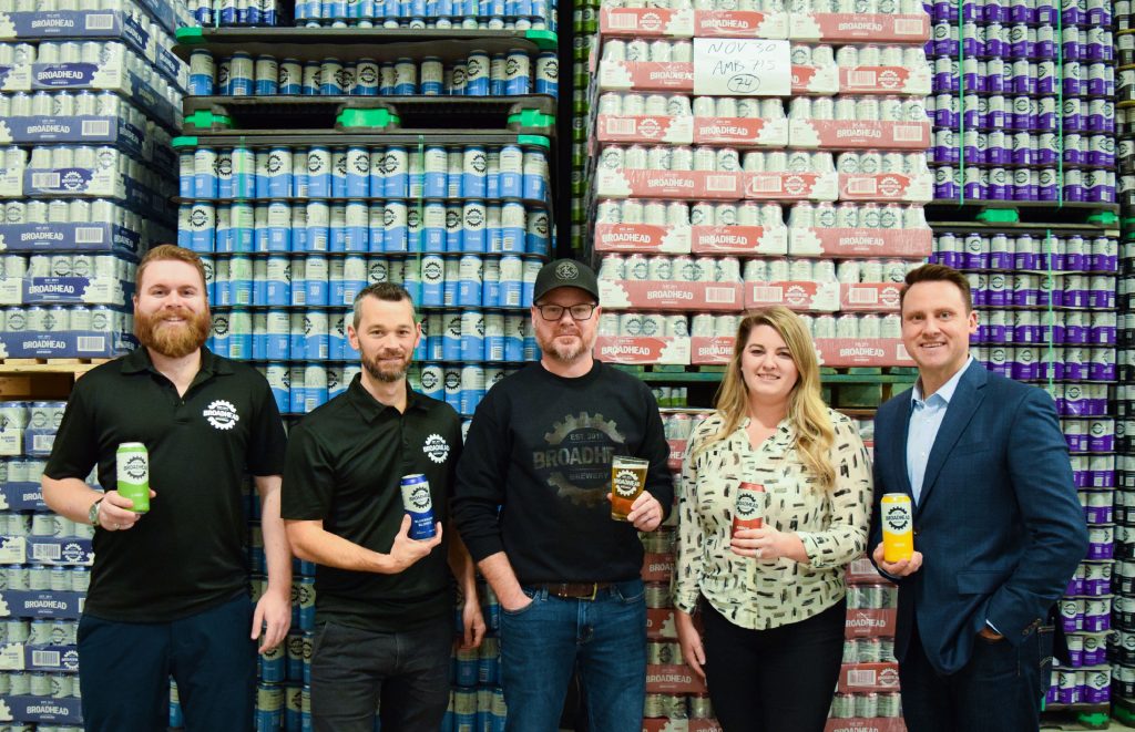 broadhead and ottawa convention centre staff standing in front of beer cans