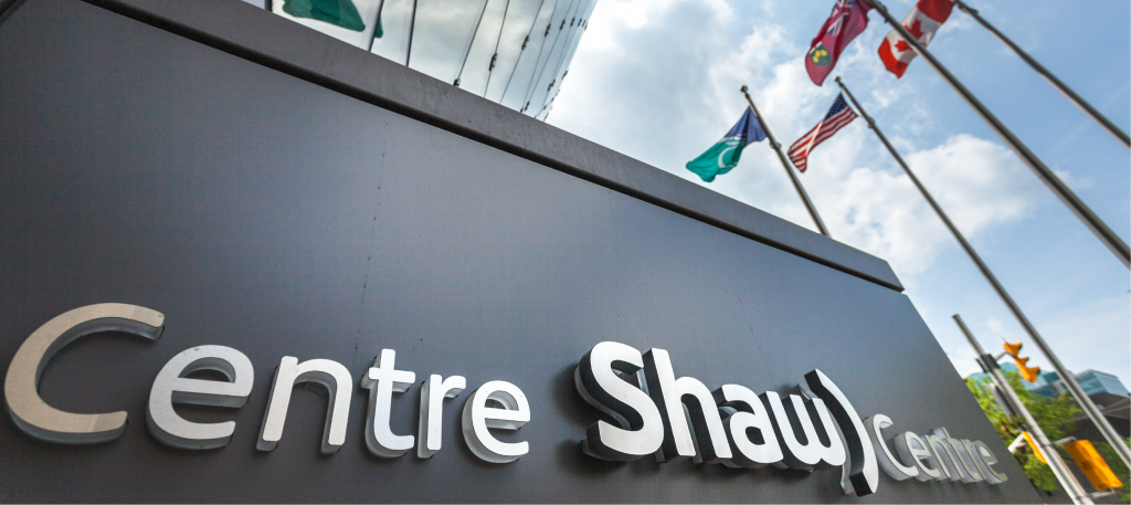 Shaw centre outside sign with flags