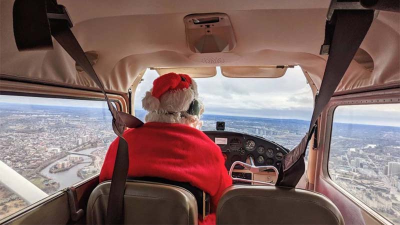 Santa flying helicopter