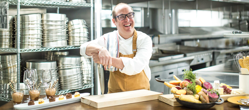 chef turcot smiling in kitchen