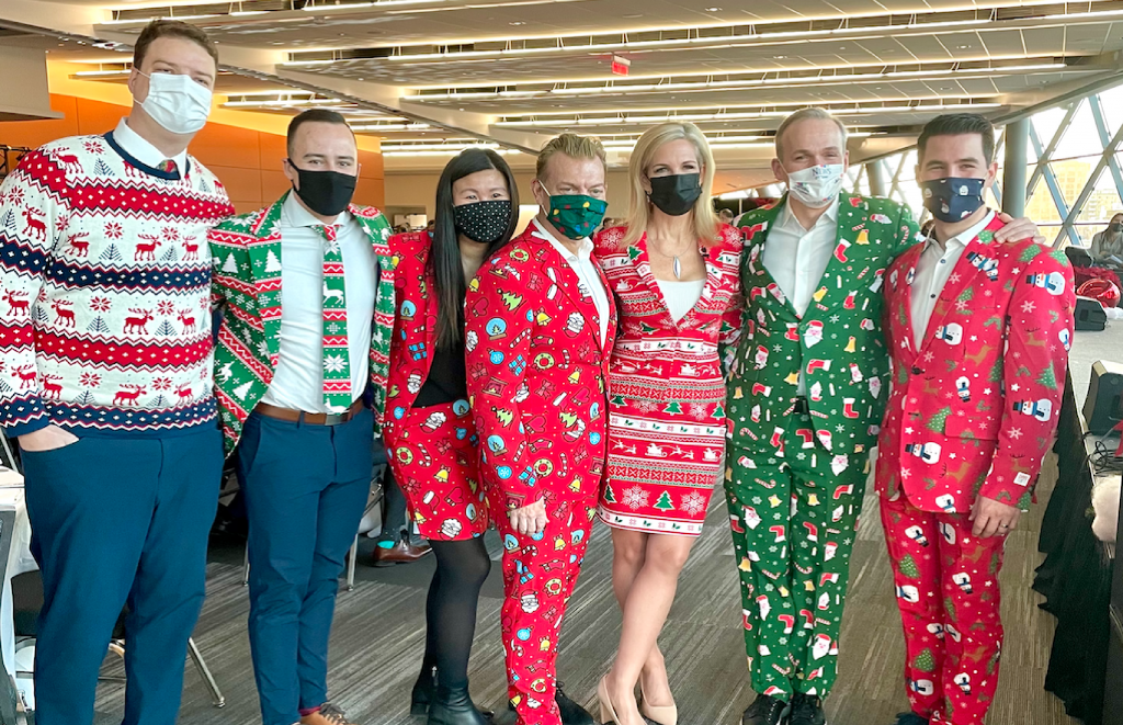 Group of people in christmas outfits