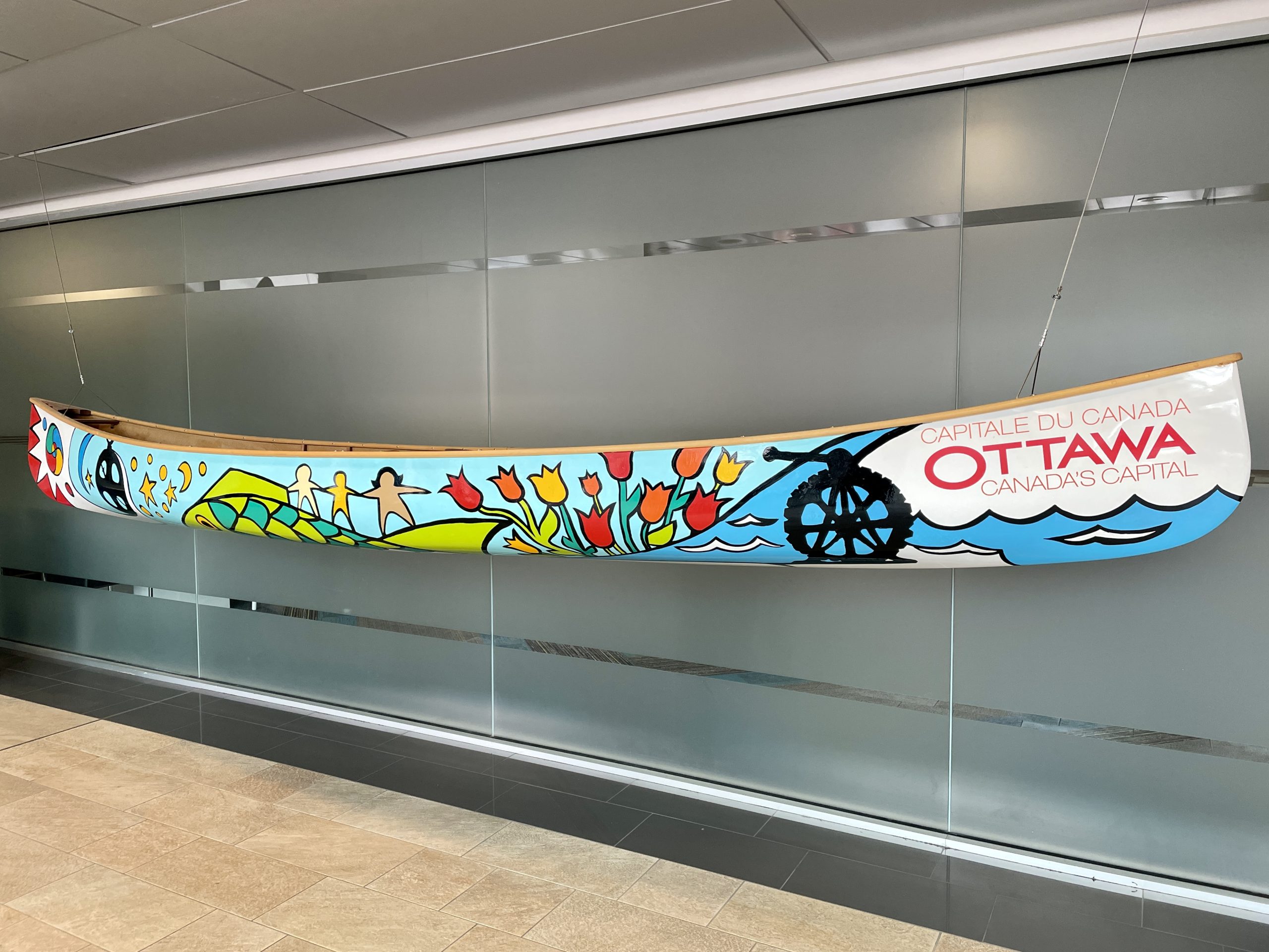 Commemorative Canoe hanging in Shaw Centre lobby