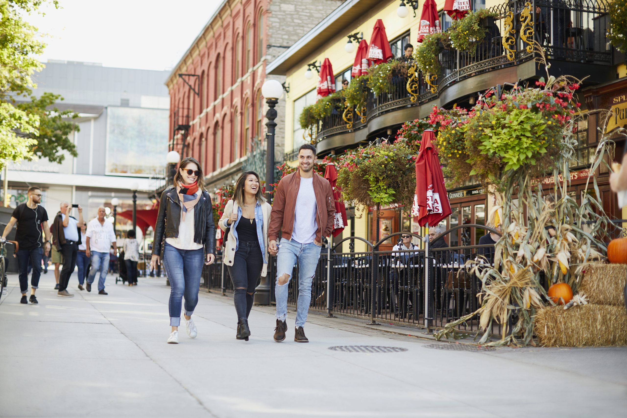People walking through Byward Market in the fall